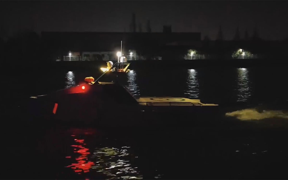 eSV patrol boat operating at night with searchlight and starlight camera