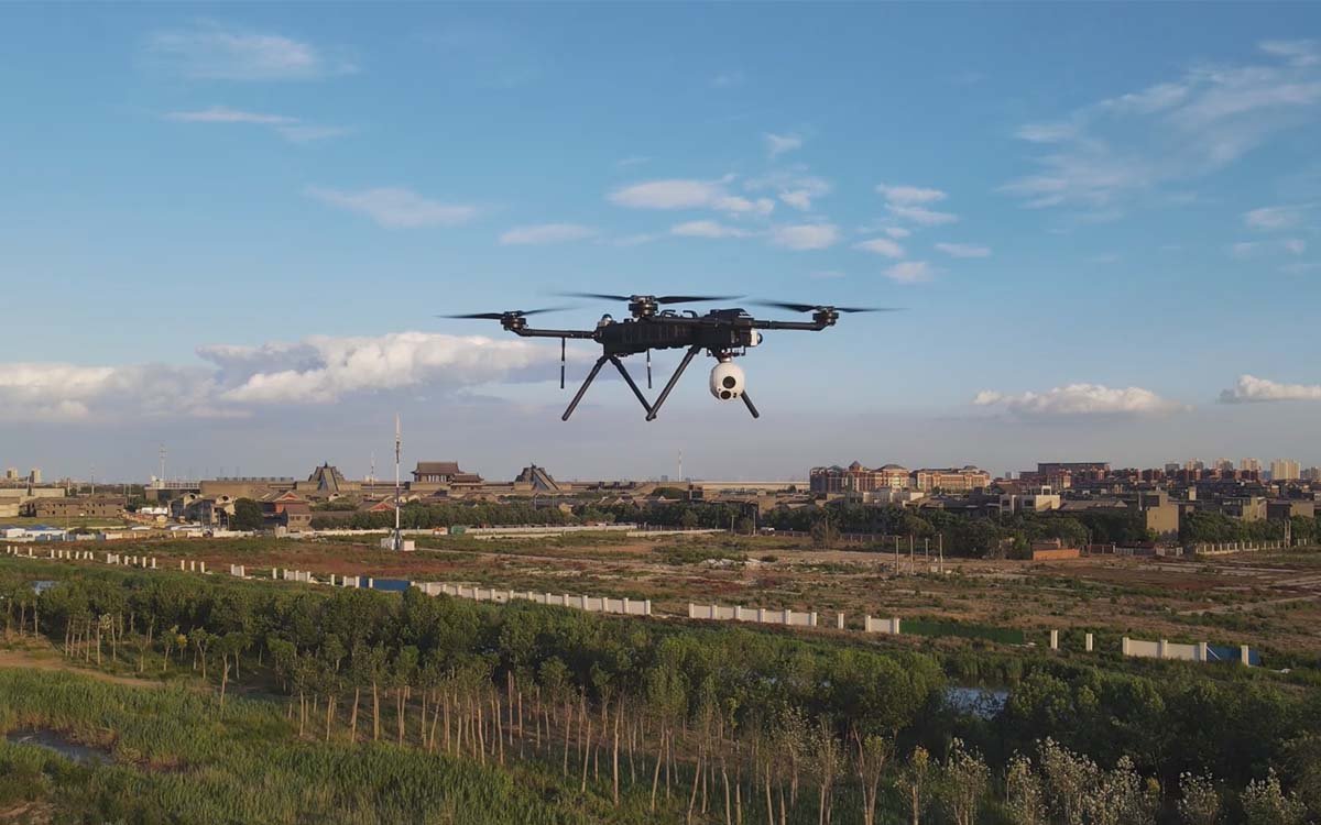 eX4 quadcopter carrying multiple payload modules including camera and LiDAR
